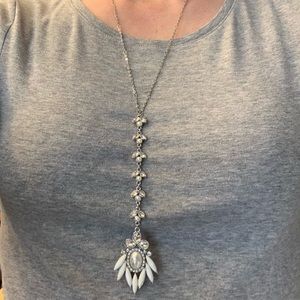 💰 Silver and white pendant necklace